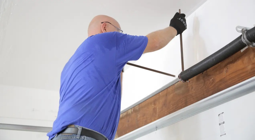 Technician performing same day garage door repair Reseda on residential garage door system